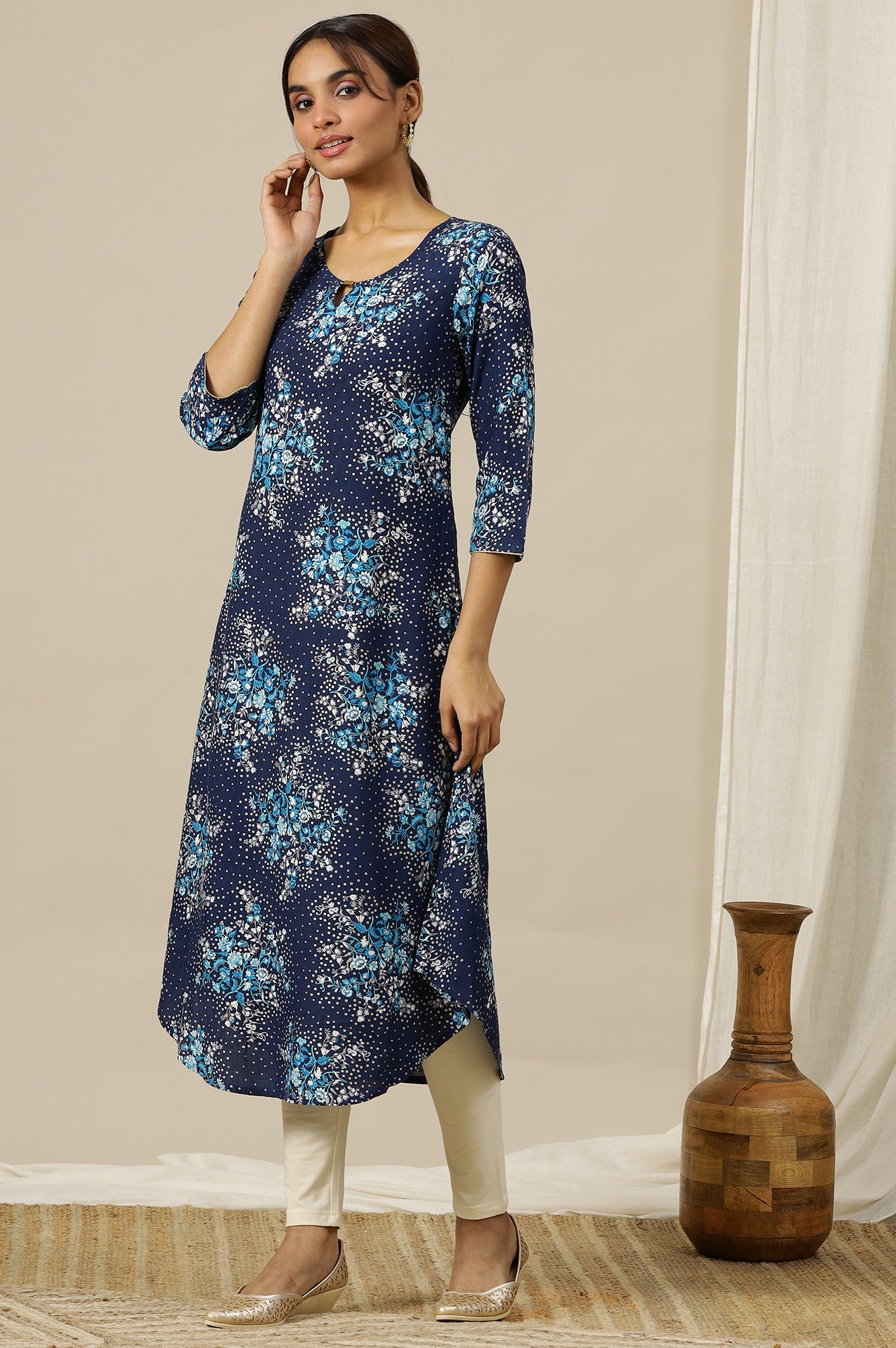 Blue Floral Printed Asymmetrical Kurta with Neck Metal Clasp