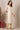 Beige Abstract Printed Georgette Kurta with Embellished Neck