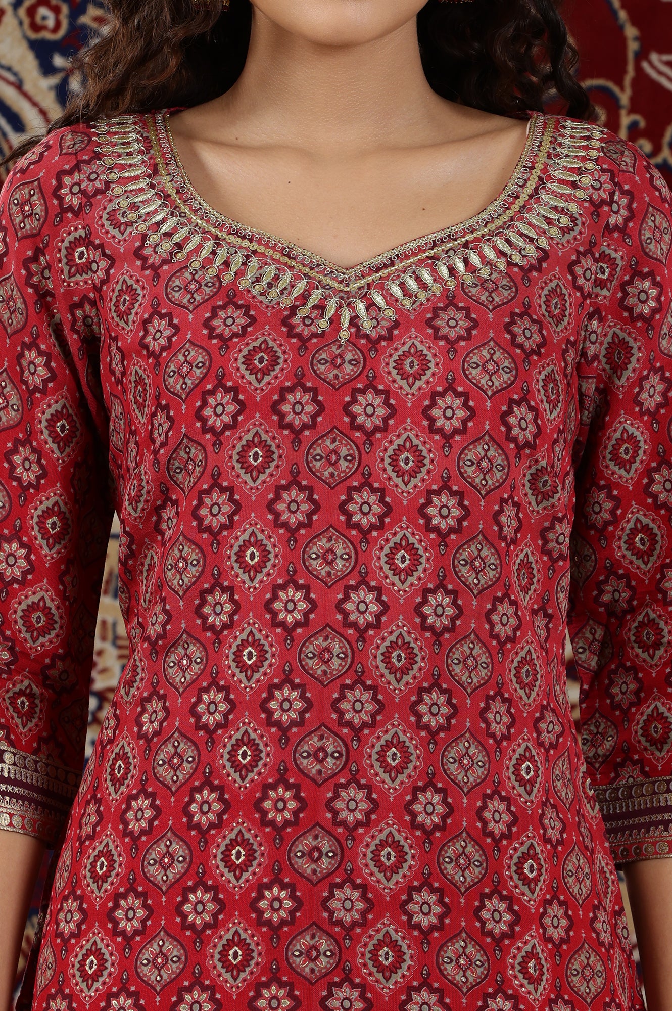 Jazzy Maroon Printed Straight Kurta with  Neck Embroidery