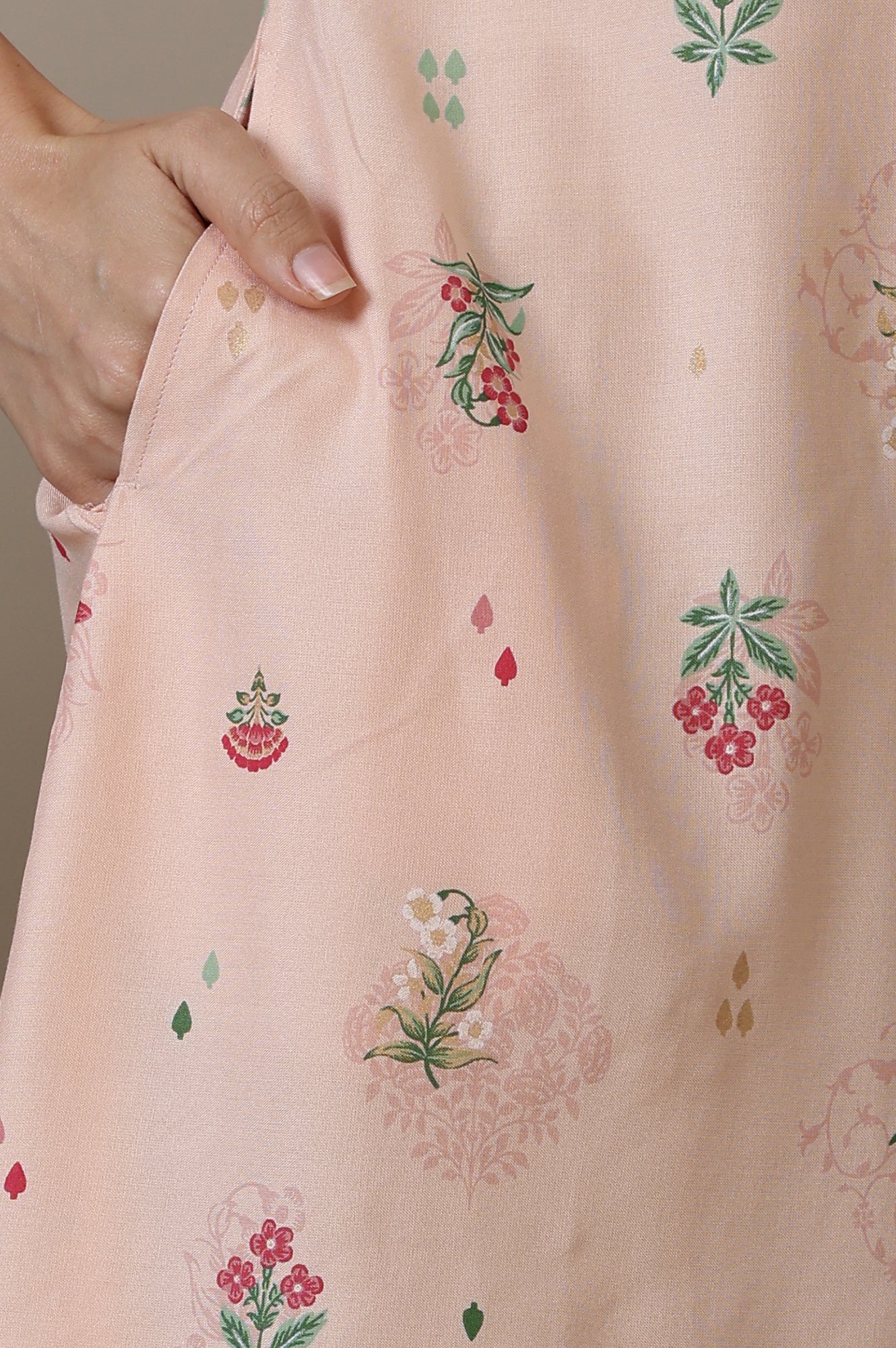 Light Peach Foil Floral Printed A line Rayon Kurta with Curved Hemline