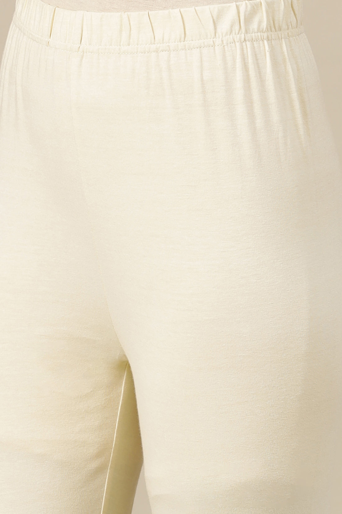 Seed pearl Cream Solid Cotton Lycra Stretchable Tights in Mid-Rise