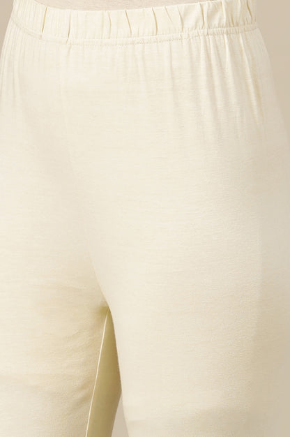 Seed pearl Cream Solid Cotton Lycra Stretchable Tights in Mid-Rise