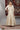 Off-White Yarn-Dyed Sleeveless Anarkali Dress and Embroidered Short Jacket Set