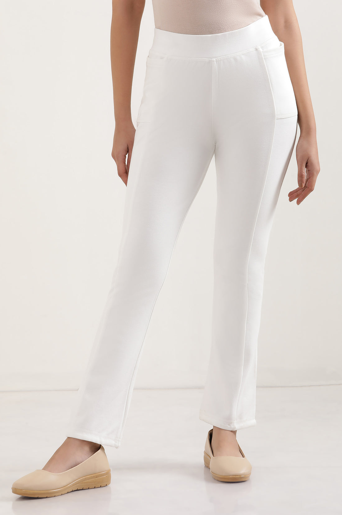 Off White Solid Boot Cut Pants With Elasticated Waist