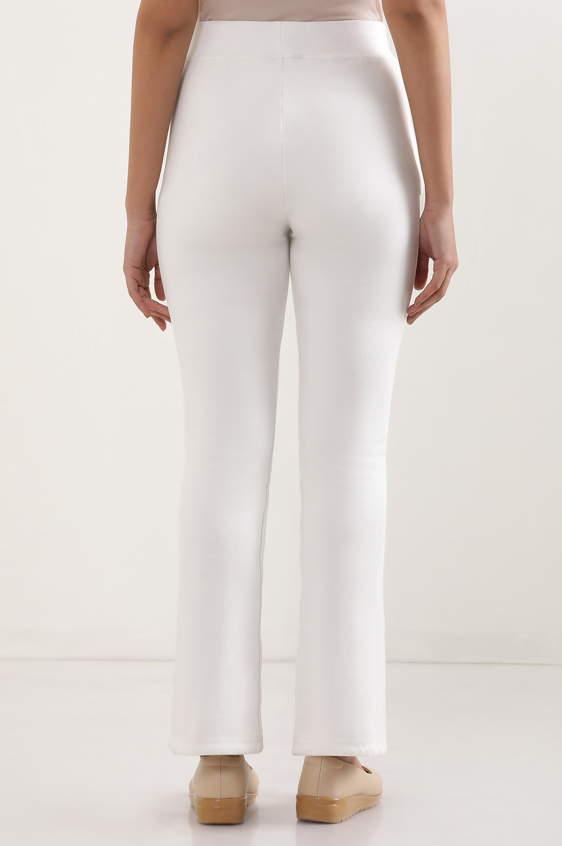 Off White Solid Boot Cut Pants With Elasticated Waist