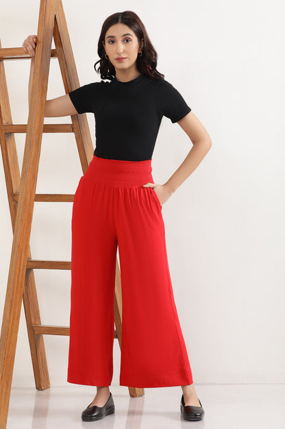 Red Flared Pants with Smoked Waistbelt