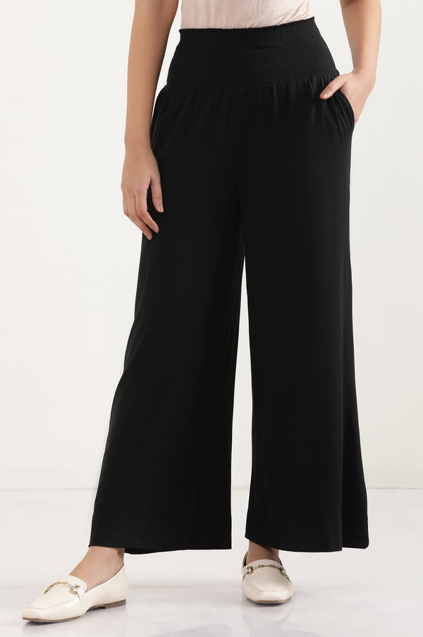 Elleven Women's Black Solid Flared Pants With Smocked Waistbelt