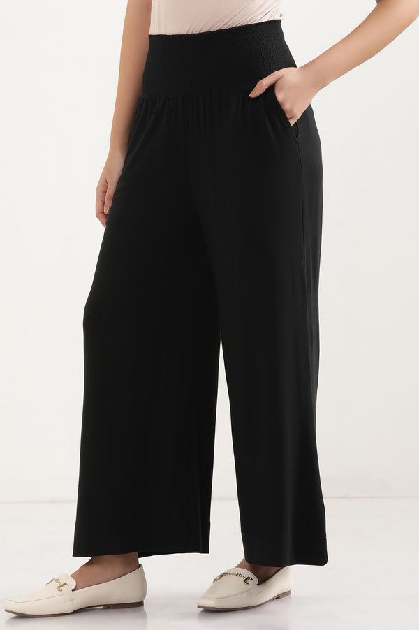 Elleven Women's Black Solid Flared Pants With Smocked Waistbelt