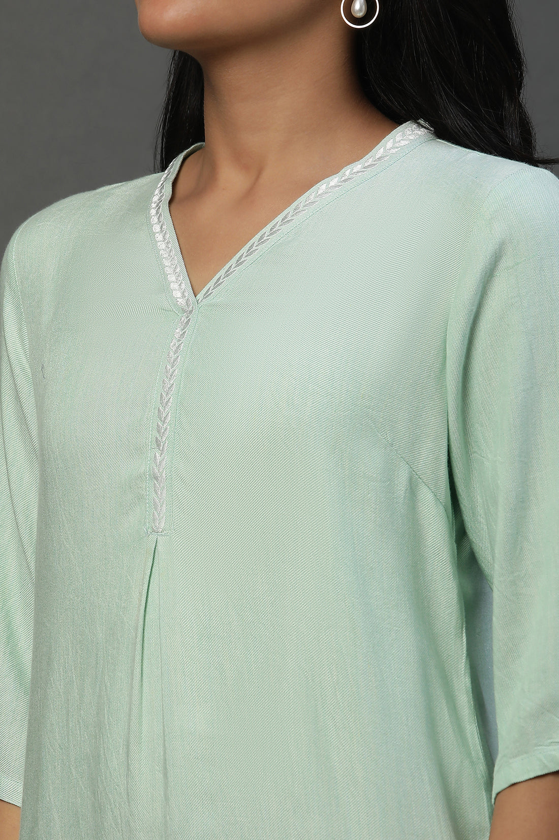 Green Causal Kurti with Embroidery on Neck