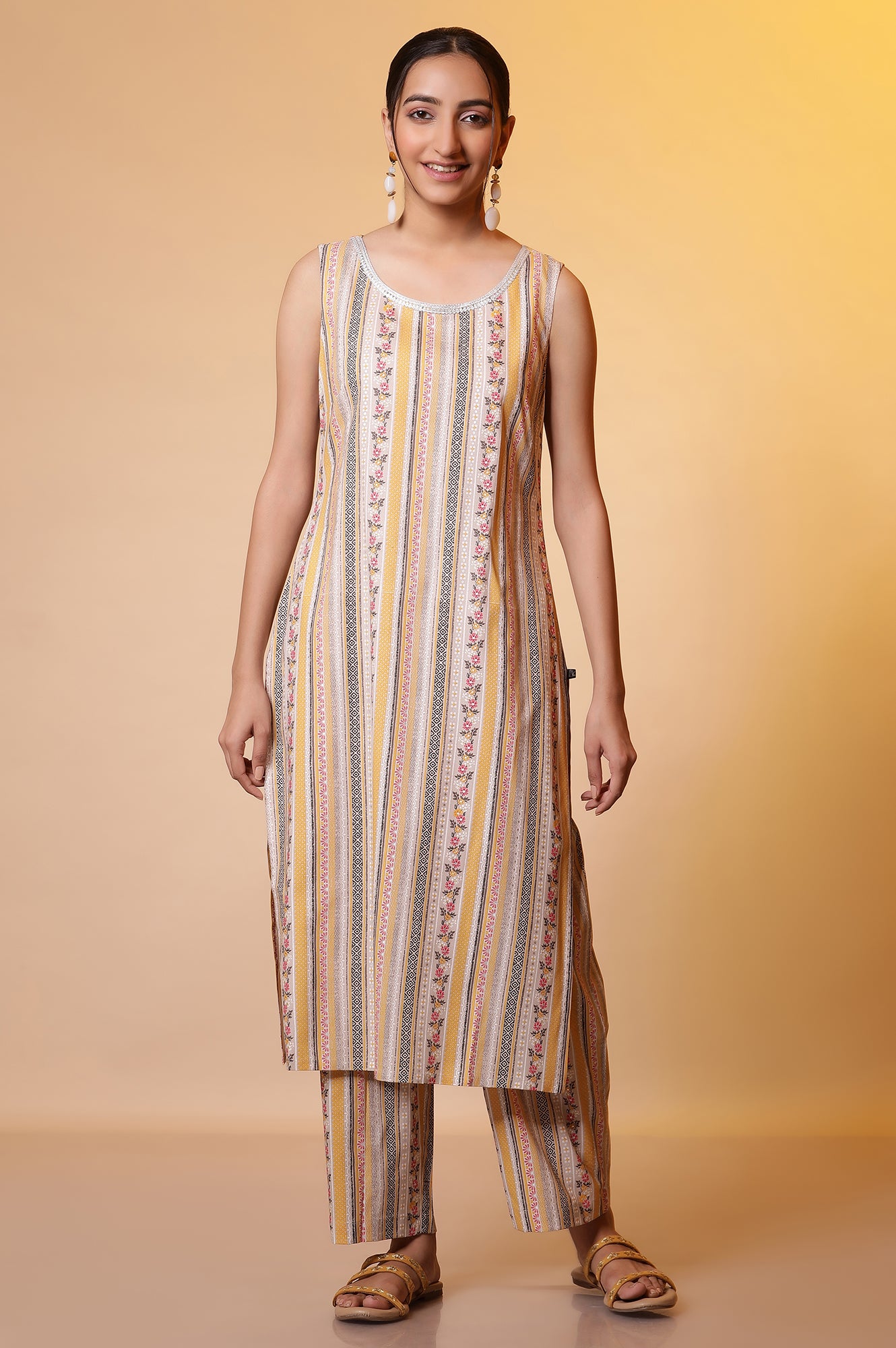 Beige Printed Sleeveless Kurta, Floral Gilet and Trouser Set