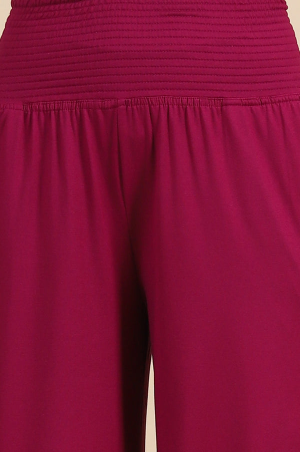 Elleven Women's Purple Solid Flared Pants With Smoked Waist