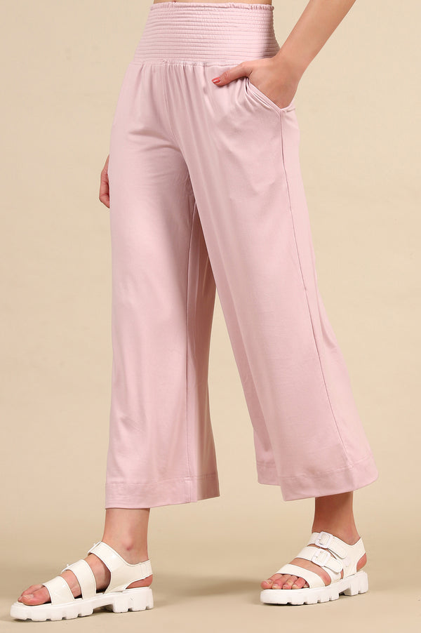 Elleven Women's Pink Solid Flared Pants With Smoked High Waisted Detail