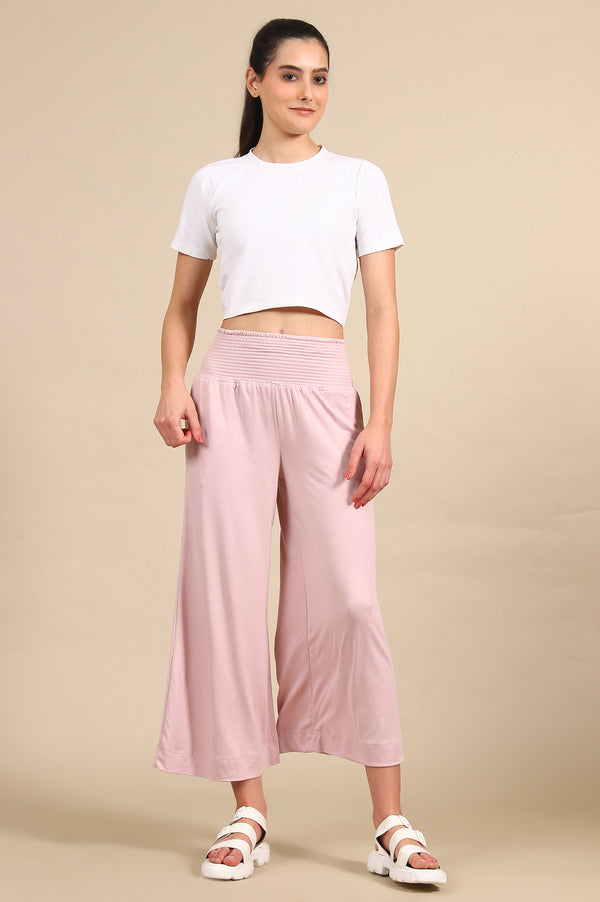 Elleven Women's Pink Solid Flared Pants With Smoked High Waisted Detail