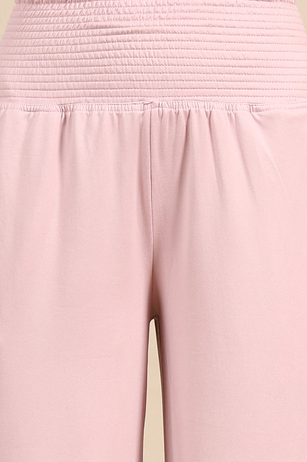 Elleven Women's Pink Solid Flared Pants With Smoked High Waisted Detail