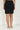 Black Denim Lycra Mid Rise Mid Thigh Length Skirt
