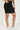 Black Denim Lycra Mid Rise Mid Thigh Length Skirt