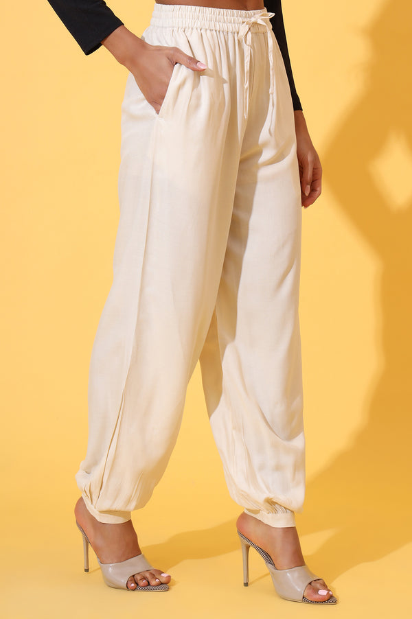 Elleven Women's Beige Solid Ankle Length Rayon Harem Pants