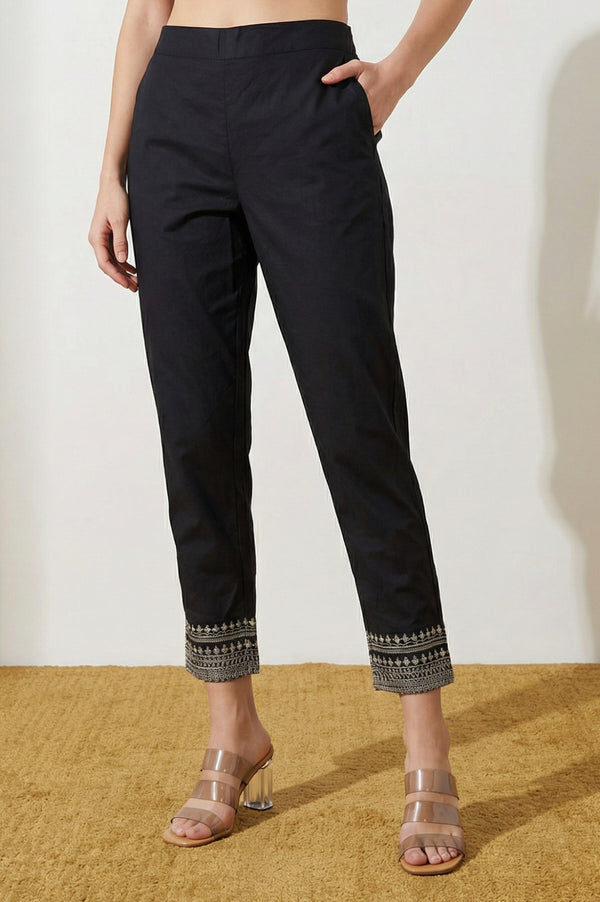 Elleven Women's Black Straight Fit Ankle Length Trousers with Embellished Hemline
