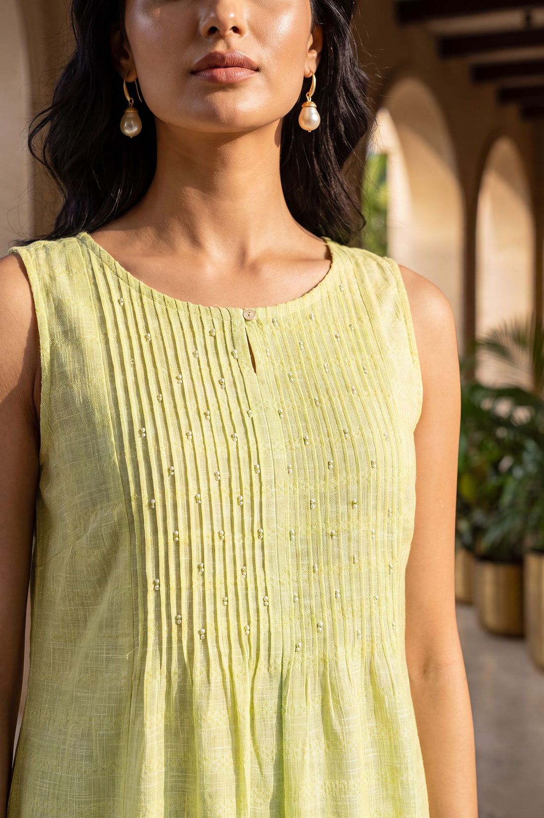 Lime Green Solid Pure Cotton Straight Fit Keyhole Neck Sleeveless Calf Length Kurta with Pintucks &amp; Beads
