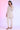 Off White Solid Straight Kurti