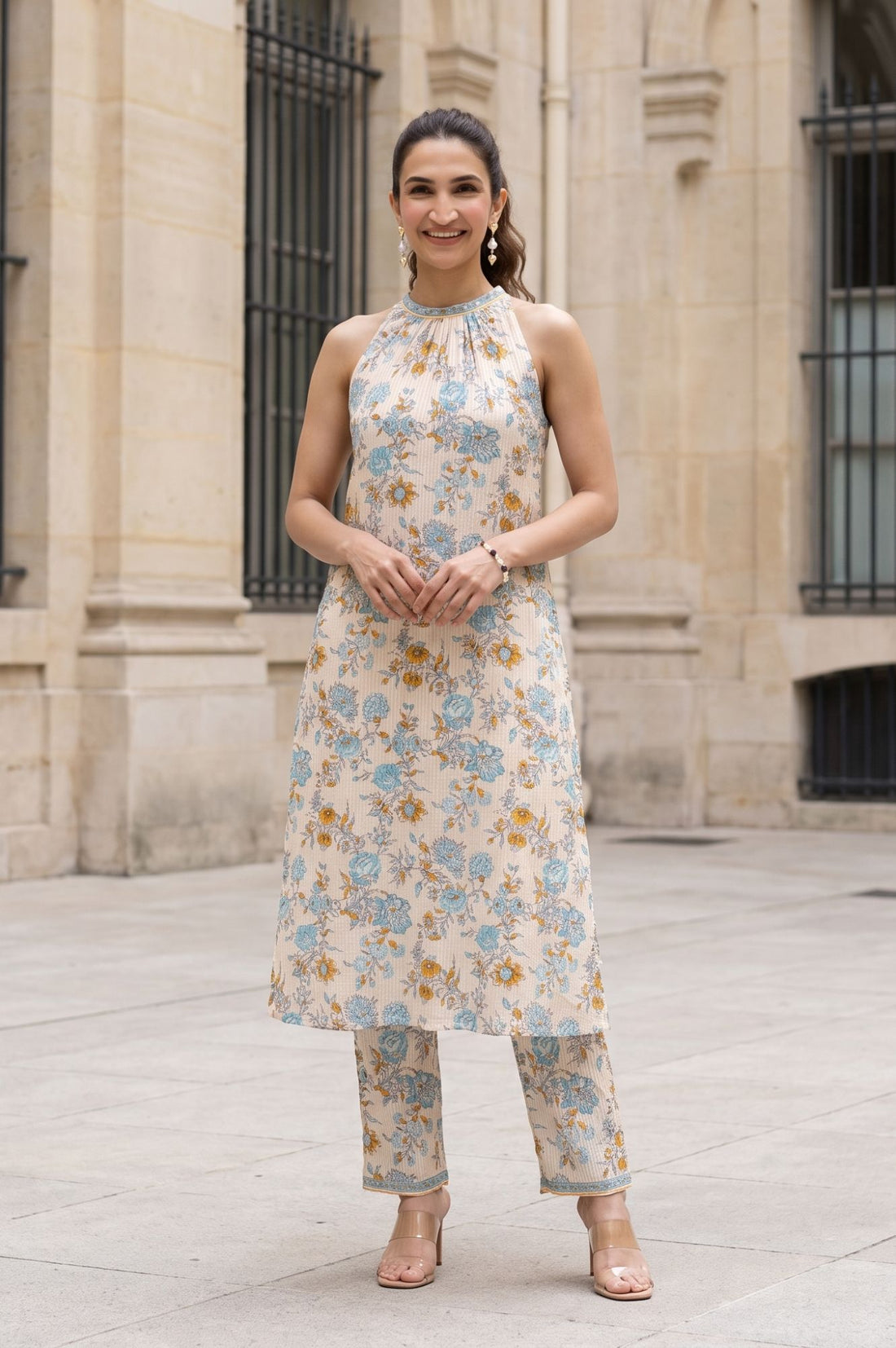 Beige Floral Print Pure Cotton Straight Calf Length Sleeveless Halter Neck Kurta with Ankle Length Straight Fit Trousers (Set of 2)