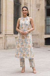 Beige Floral Print Pure Cotton Straight Calf Length Sleeveless Halter Neck Kurta with Ankle Length Straight Fit Trousers (Set of 2)
