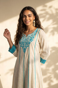 Off White Thread Embroidered Pure Cotton Flared Kurta with Trousers Set